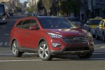 2014 Hyundai Santa Fe in Regal Red Pearl - Driving Front Right View